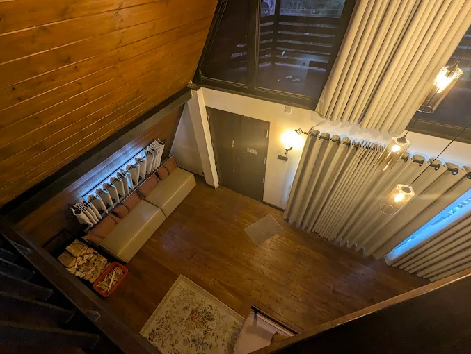 View down from the mezzanine onto the living room